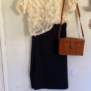 Black knee length pencil skirt with side slit